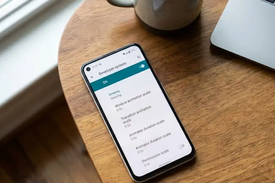 Android Developer Options screen showing animation scale settings at 0.5x