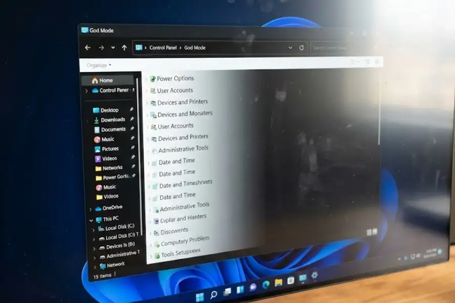 God Mode window open showing settings categories in Windows