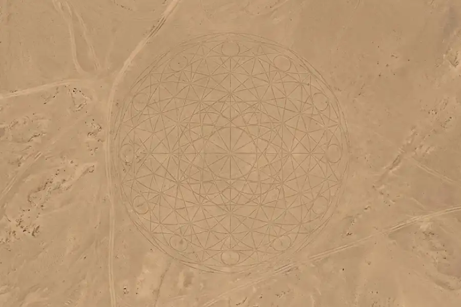 Google Maps Easter Eggs: 15+ Surprises You Need to Try Right Now (2026) 3 Aerial satellite view of a strange circular pattern visible in a desert landscape on Google Earth